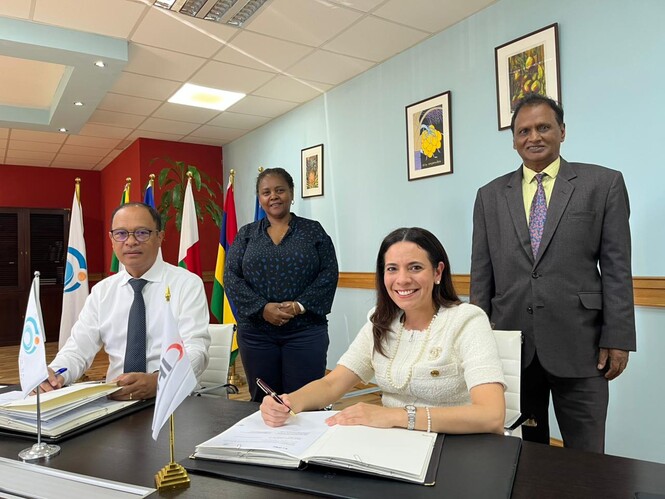 IOC MoU signing